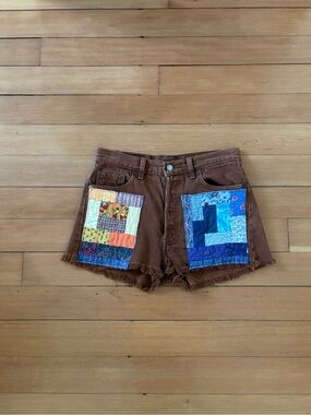 Vintage Levi’s 501 cut offs rust brown with quilted patches on front 90s USA
